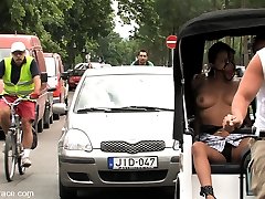 This smoking hot Latin slut gets tied up on the street and used by two men. People crowd around...