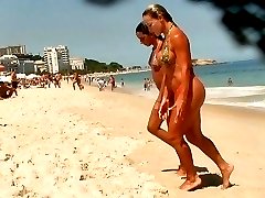 Sexy babes in tiny bikinis get spied on hidden camera when walking out of the warm sea