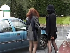 Two babes flashing their orbs and pussy in public place
