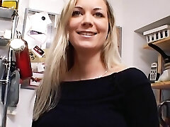 Outstanding German Cougar with huge boobs dildoing her shaved slit in the kitchen