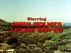 Old-school porn with John Holmes getting his big manmeat sucked