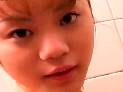Cute petite Japanese girlie takes shower flashing her ultra-cute ass and bumpers
