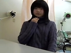 Young Chinese gal reaches an orgasm at her gyno.s office