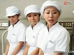 Asian nurses slurping spunk out of loaded shafts in group