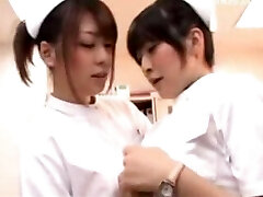 Young Nurse Rubbing Her Pussy With Pen Her Colleauge Joins Her Kissing Kneading Tits