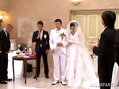 Japanese bride gets fucked by a few guys after the ceremony