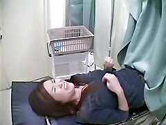 A fresh girl is explored on the gynecological table in this sizzling medical voyeur video