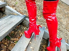Step by step Lady L red boots extraordinary high heels.