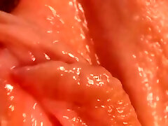 Close up of hot pink wet beaver and clit