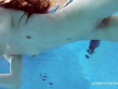 Roxalana Cheh sexy sandy-haired underwater