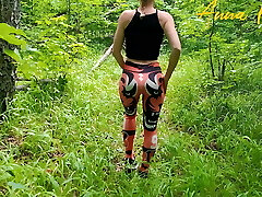 Public masturbation, a girl in leggings ambles in nature
