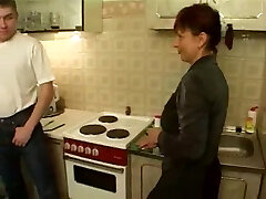 Russian Cougar Pleasing Crowd Of Cocks