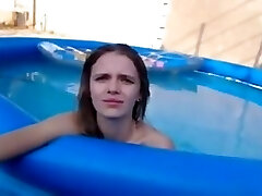 College chick with small boobs gets fucked in the pool