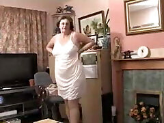 Brit granny strips naked for you