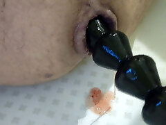 Anal beads yam-sized black full insertion