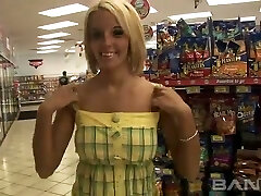 Cute blondie haired chick flashes her pierced muff in the shop