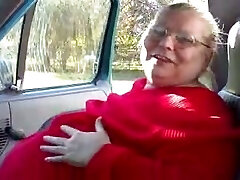Sloppy BBW grandmother of my wife shows off her flabby juggs in car