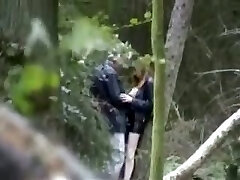 Insatiable couple making love deep in the forest spy sex video