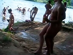 Hidden cam video taken while strolling through a nudist beach