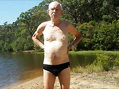 senior man skinny dips
