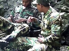 Army boys scout for stiff meat outdoors