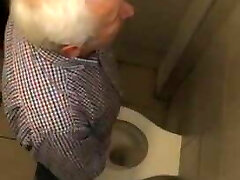 Old Greek man pee station 