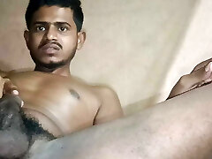 Indian boy flashing his big cock in front of camera