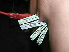 Dominatrix ladies in leather dominate a man with toys