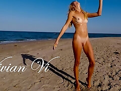 Naked Workout on the beach - a beautiful skinny cougar with small tits