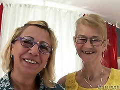 Platinum-blonde grannies Milli and Beata finger and toy each other's shaved vags