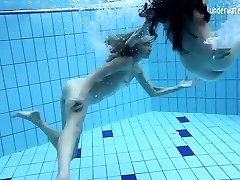 Two super-steamy lezzies in the pool loving eachother