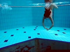 Milana And Katrin Unwrap Eachother Underwater