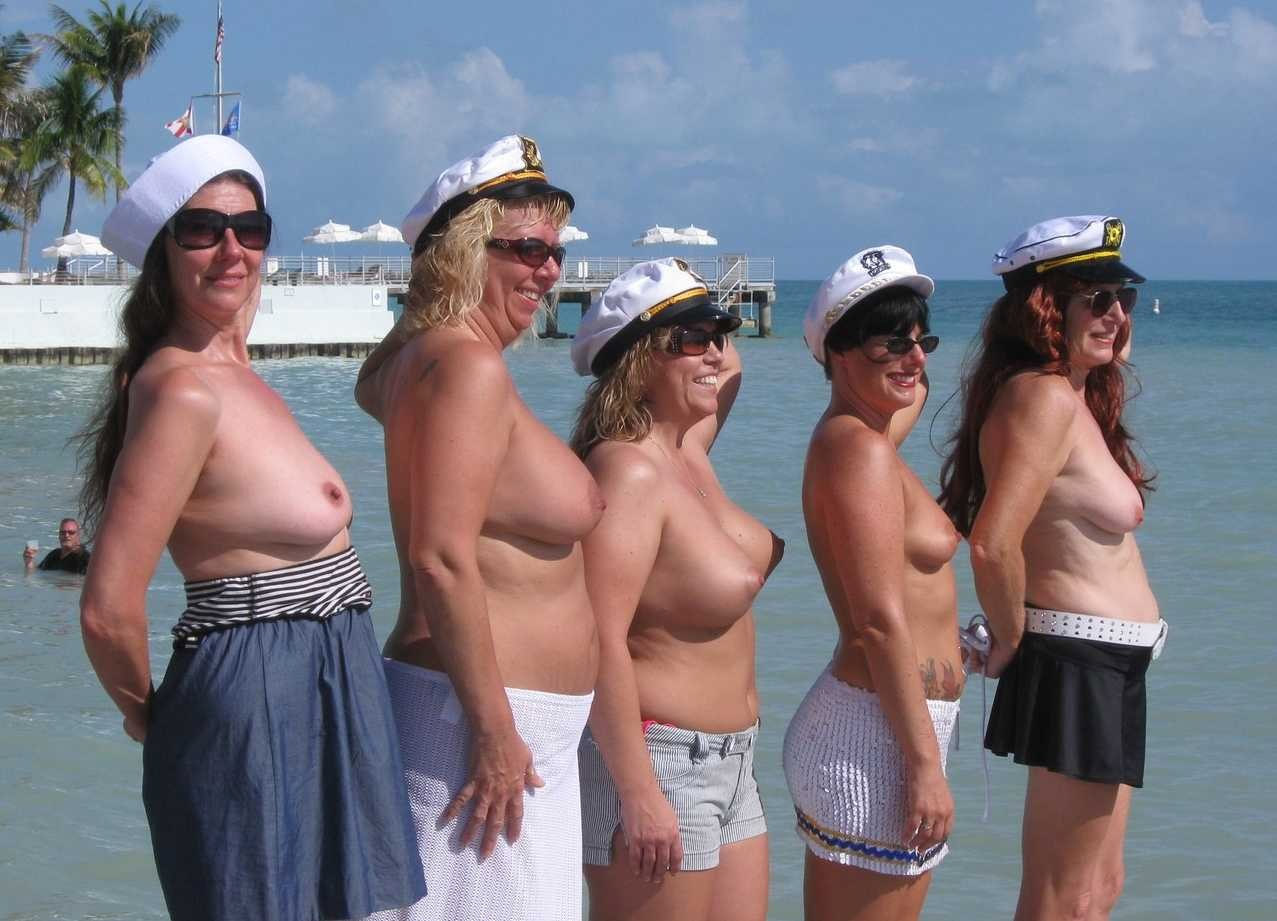 Mature nudist wives in a boats