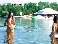 Two hot babes are nude and enjoying the sun while someone is taking sexy nudist sex video alice dixson of them