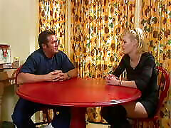Horny man bangs his young blonde girlfriend on the kitchen table
