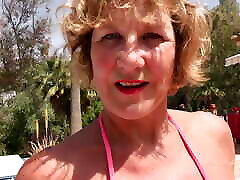 AuntJudysXXX - Horny razzers all dolled up Cougar Mrs. Molly Sucks Your Cock by the Pool POV