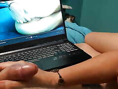 Watching xxx reales while giving handjob