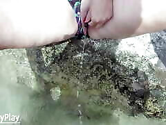 Outdoor red xxx sunny hole insertion with piss in water