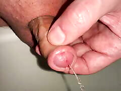 pee play with my little foreskin dick