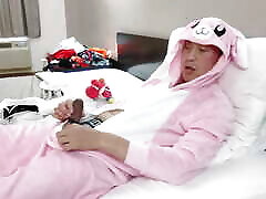 Hot Asian posing in my new pink onesie and zippered black boxer briefs in cheap motel