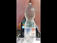 Bottle with a 90mm bulb in a complete abuse forced teens insertion of the bulb and sample of the final result. Session 095. 20230825