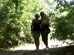 Mature woman have big bear spa in forest