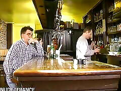 A guy sharing his pretty young girlfriend getting gangbanged inside a bar