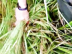 Wetlook adventure at swamp lake wearing hunter boots black leggings and sport dress.