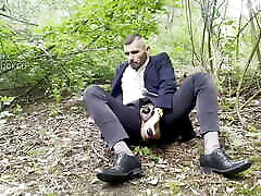 suited gentleman is spreading legs like slut and plays with his malepussy with locked dick