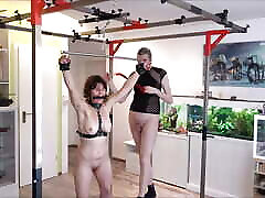Slave 100 day pregnant Brought to Orgasm While Hanging with a Spreader Bar