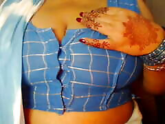After kissing her boobs, she sucks her sexy boobs and then fingering her pussy.