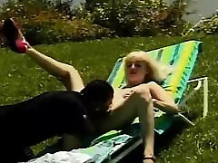 Classic blonde MILF bimbo enjoys anal sex outdoors