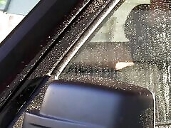 Hot girl rides on big changing room in beach after car wash