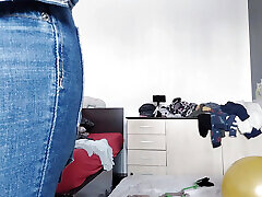 An amateur has fun trying on clothes she has cut. An amateur dances naked in the house.